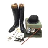 Pair of black leather hunting boots with wooden trees, boot pulls, spurs, riding bowler hat and rela