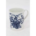 A Caughley blue and white mug, printed with floral sprays, C mark to base, 8.5cm high