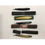 Collection of various items to include cut throat razors in cases, gramaphone needles, papier mache