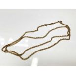 Yellow metal chain, 66cm long