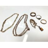 Group of 9ct gold jewellery to include a necklace, bracelet, chain and three rings