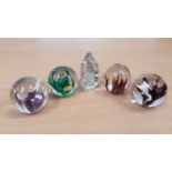 Five Wedgwood paperweights, circa 1970s, four sea fern and one clear Galaxy (5)