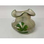 Loetz style Kralik iridescent glass vase decorated with a green flower, 11cm high
