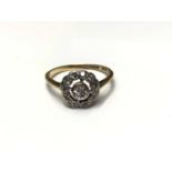 Antique diamond cluster ring with an openwork cluster of diamonds in platinum setting on 18ct gold s