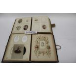 Two large Victorian leather and brass photograph album, one with illustrated pages, containing mainl