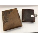 Two Victorian leather bound photographs albums containing cabinet cards, carte de visites and photog