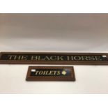 The Black Horse pub sign together with a matching Toilets sign (2)