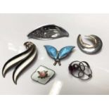 Group of Scandinavian silver and enamelled brooches including David Anderson, Asch Grossbardt etc an