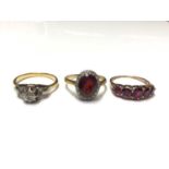 18ct gold diamond ring, 18ct gold garnet and diamond cluster ring and Edwardian garnet five stone ri