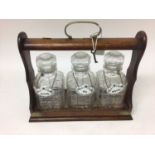 Edwardian three bottle oak tantalus