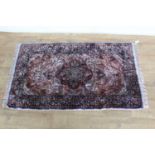 Eastern rug with floral decoration, 128cm x 76cm