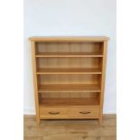 Contemporary light oak open bookcase with adjustable shelves and two drawers below, 95cm wide, 28.5c