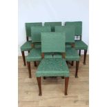Set of six dining chairs with loose green covers