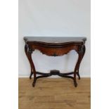 Continental mahogany serpentine shaped card table.