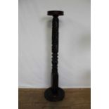 Victorian-style torchere with foliate carved column, on circular base, 156cm high