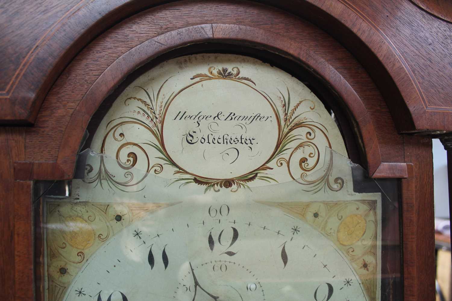 Georgian 8 day long case clock by Hedge & Bannister of Colchester with painted dial in inlaid oak - Image 4 of 5