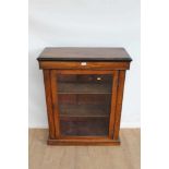 Late Victorian inlaid walnut pier cabinet with shelved interior enclosed by glazed door,