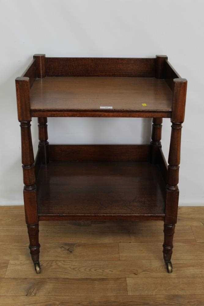 Victorian mahogany two tier table/whatnot on turned legs with brass capped castors, 52cm wide, 44.5c