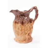 Early 19th century salt glazed Bacchanalian jug