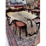 Zebra skin rug.