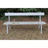 Victorian grey painted cast iron bench with naturalistic gnarled supports and wooden slats, 180cm wi