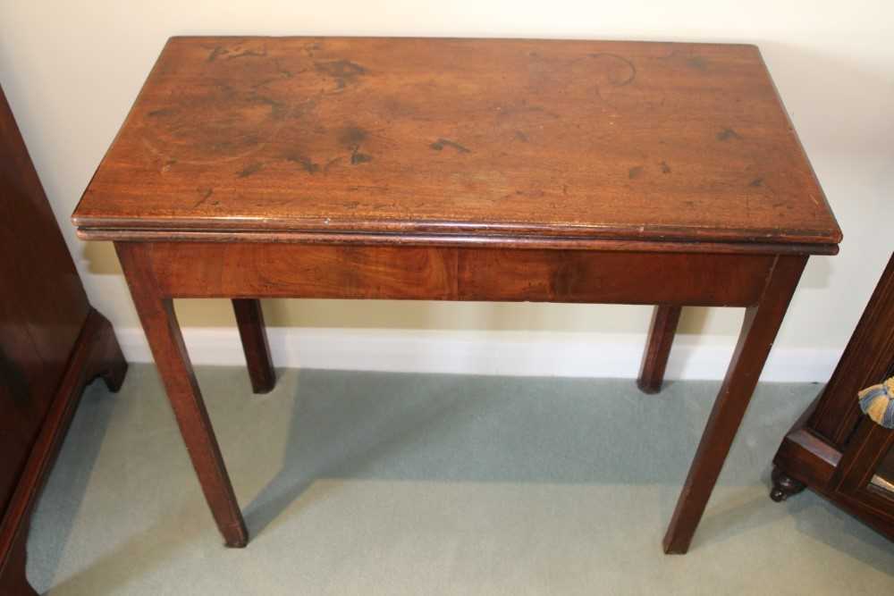 George III mahogany tea table with rectangular fold-over top, on square legs, 83cm x 41cm