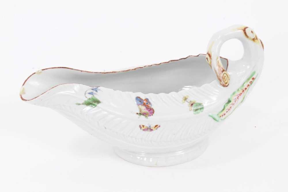 A Worcester cos lettuce shaped sauce boat, painted in Meissen style, circa 1756