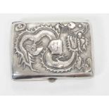 Late 19th/early 20th century Chinese white metal cigarette case, the cover with raised Dragon decora