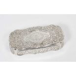 Victorian silver snuff box of shaped rectangular form, with engraved foliate decoration