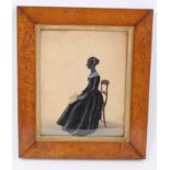 Regency silhouette portrait of a lady seated in profile.