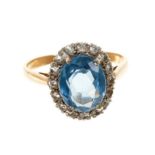 Blue topaz and white stone cluster ring