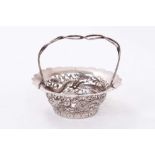 Late 19th/early 20th century Chinese silver dish of circular form with pierced dragon decoration,