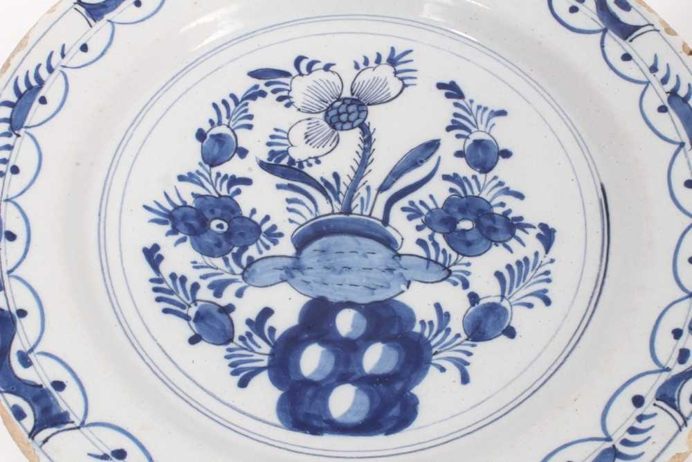 Two 18th century blue and white Dutch delftware dishes, one painted with the Peacock pattern, the ot - Image 2 of 5