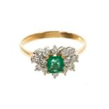 Emerald and diamond cluster ring