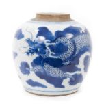 A Chinese blue and white ginger jar, 18th/19th century, painted with a dragon chasing a flaming pear