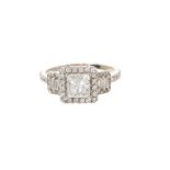 Diamond ring with a central princess cut diamond weighing approximately 1.12cts, surrounded round br