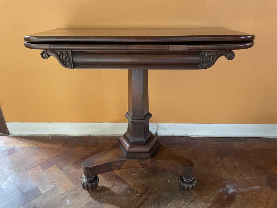 19th century rosewood card table on faceted column and trefoil base with fluted feet, 90cm wide