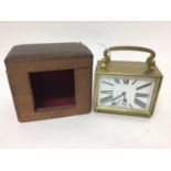 Art Deco-style carriage clock with enamel dial in brass case, striking movement on bell, 11.5 cm hig