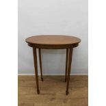 Edwardian satinwood and tulipwood crossbanded oval side table,