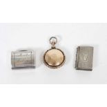 George III silver vinaigrette in the form of a purse or hand bag,and two others.