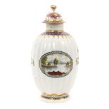 A Worcester fluted porcelain tea caddy and cover, circa 1780, of Dalhousie type, painted with a land