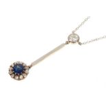 Sapphire and diamond pendant necklace with a sapphire and old cut diamond cluster suspended from a r