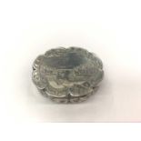 Early Victorian silver castle top vinaigrette of shaped oval form, sunset river scene.