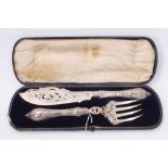 Pair Victorian silver fish servers in case