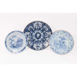 Two 18th century blue and white English/Dutch delftware dishes, together with a larger delftware dis