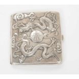 Late 19th/early 20th century Chinese white metal cigarette case, the cover with raised Dragon decora