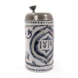 A German Westerwald stoneware tankard, dated 1814, decorated with incised foliate patterns, pewter l