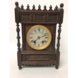 Late Victorian mantel clock retailed by John Bennett, London with silvered dial , striking movement