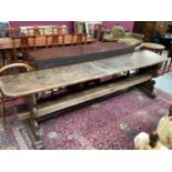 Highly unusual ecclesiastical oak refectory table/monks bench, probably 17th century, with massive s