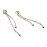 Pair of diamond pendant earrings with two graduated articulated drops, in 18ct white gold setting. E